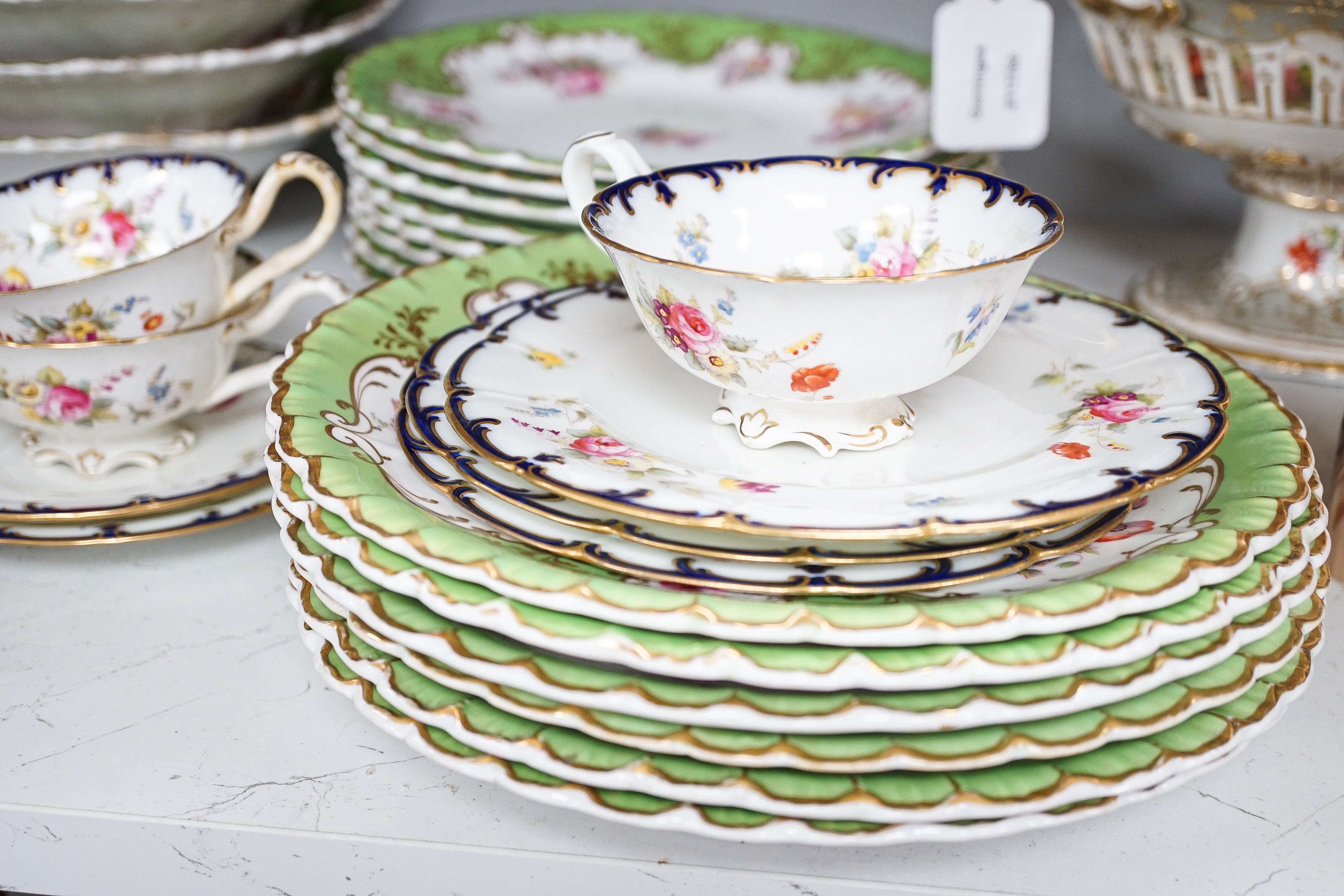 A Copeland and Garrett porcelain part dessert service, a Ridgway type porcelain part desert service and a Cauldon part tea set